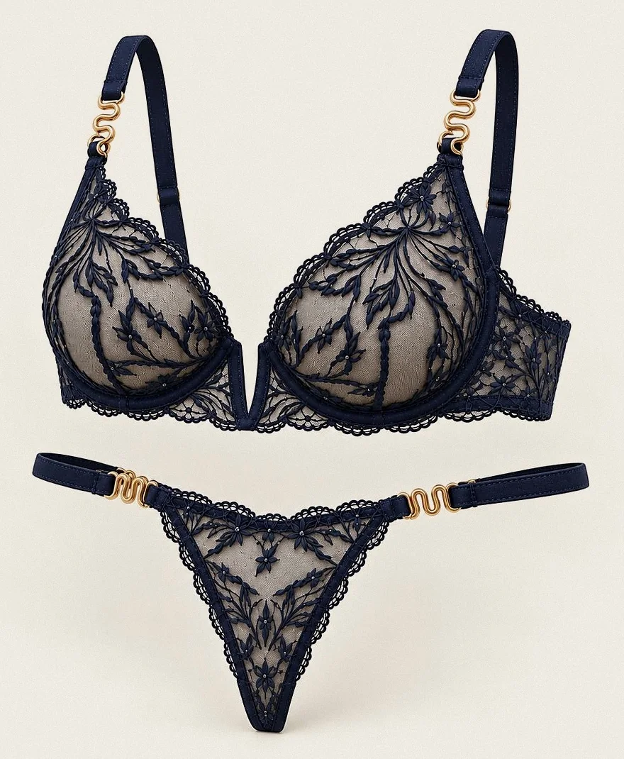 Bleu Nuit: midnight embroidered plunge bra and thong with gold serpent clasps.