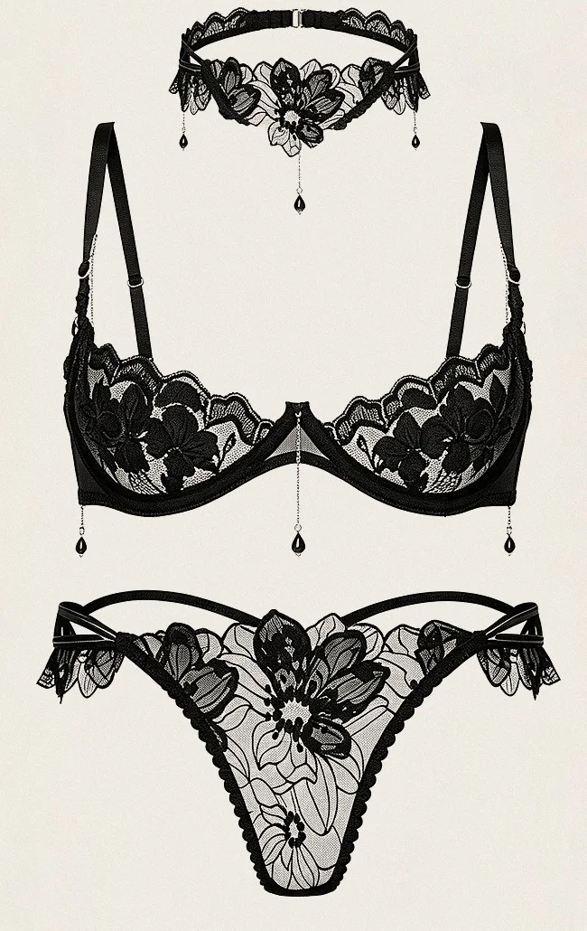 Fleur: floral appliqué quarter cup with jet drop pendants, ruffled side thong and lace choker.